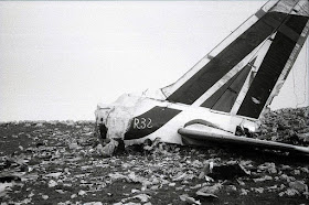 The tail fin of the ill-fated Alitalia Flight 112 after the aircraft broke up on a ridge of Montagna Longa