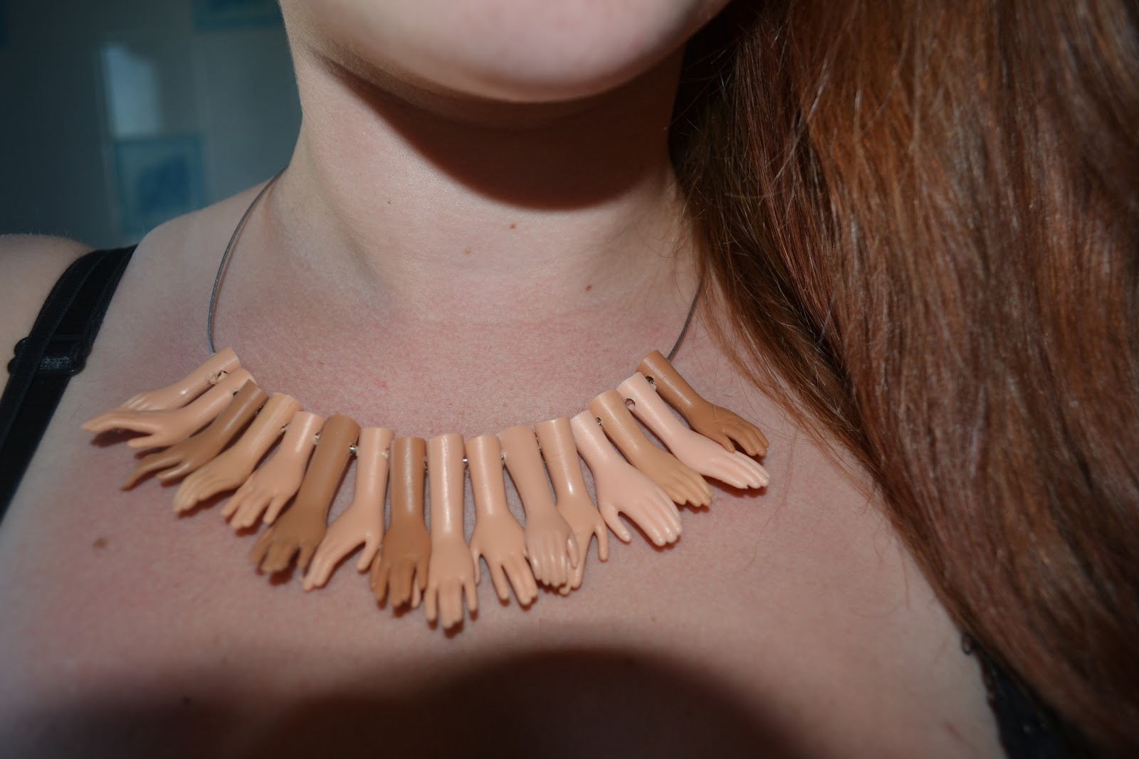 Missataylor: Barbie hand necklace.