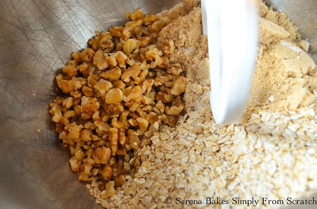Best Apple Crisp recipe has flour, oatmeal, walnuts and sugar in the topping from Serena Bakes Simply From Scratch.