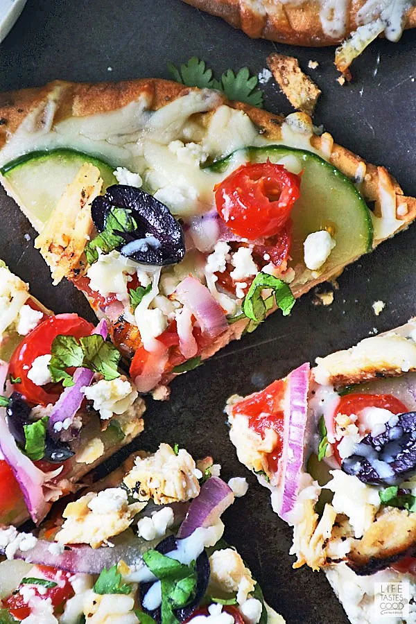 Close up of Greek Pita Pizza slices ready to eat