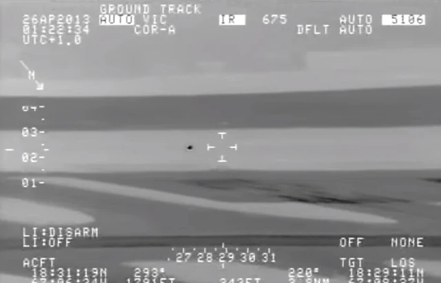 Military-plane-actually-chases-a-fast-UFO-videoing-it-in-night-vision.