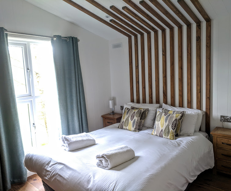 A Review of Darwin Forest & The Peak District with Tweens  - skyline view lodge in the meadows master bedroom 