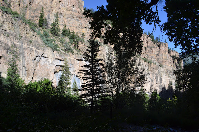 rock wall and shadow sign