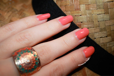 Swatch of the nail polish "Carousel Coral" from Essie