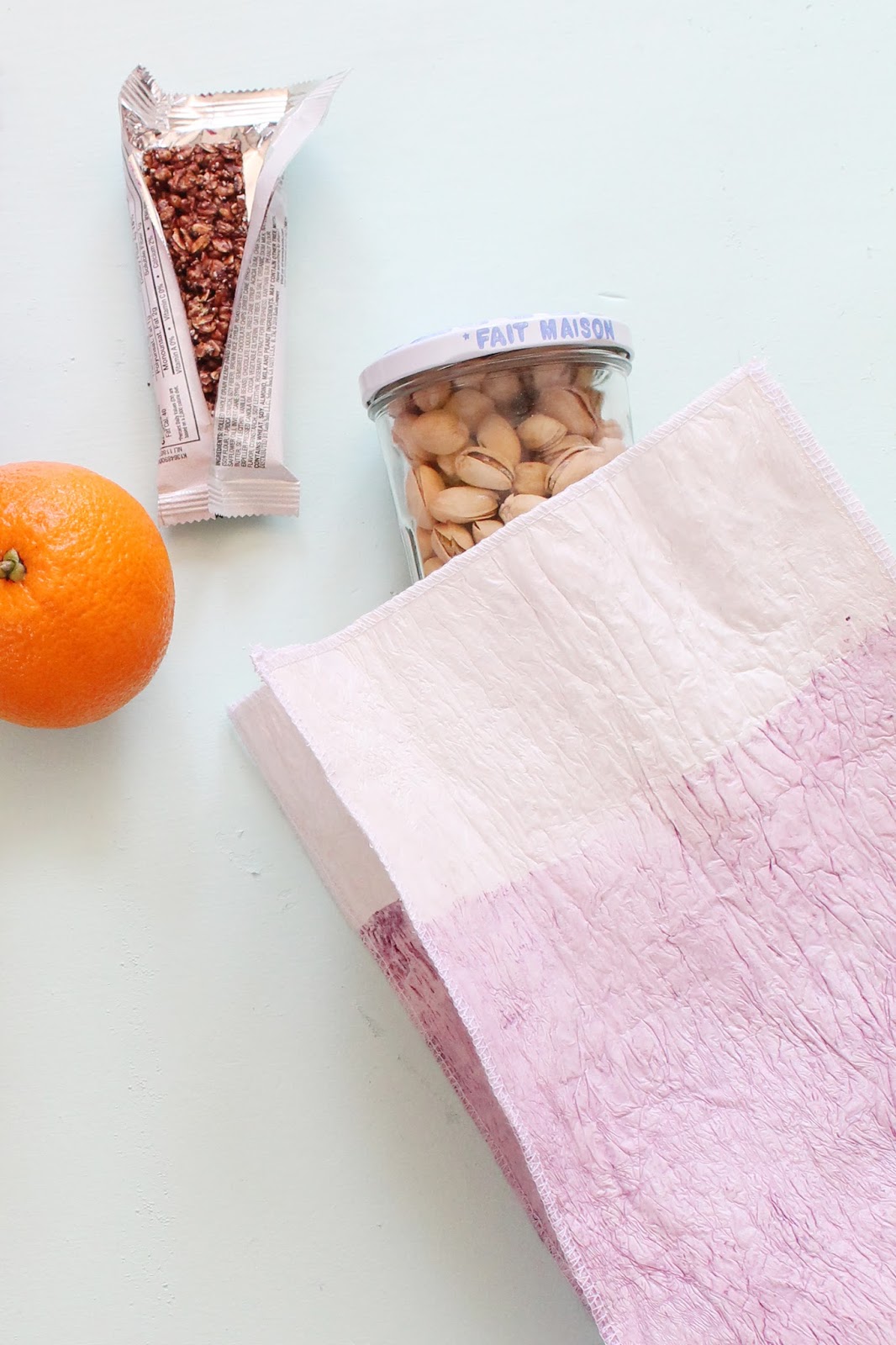 Make a dyed lunch sack from recycled plastic bags.