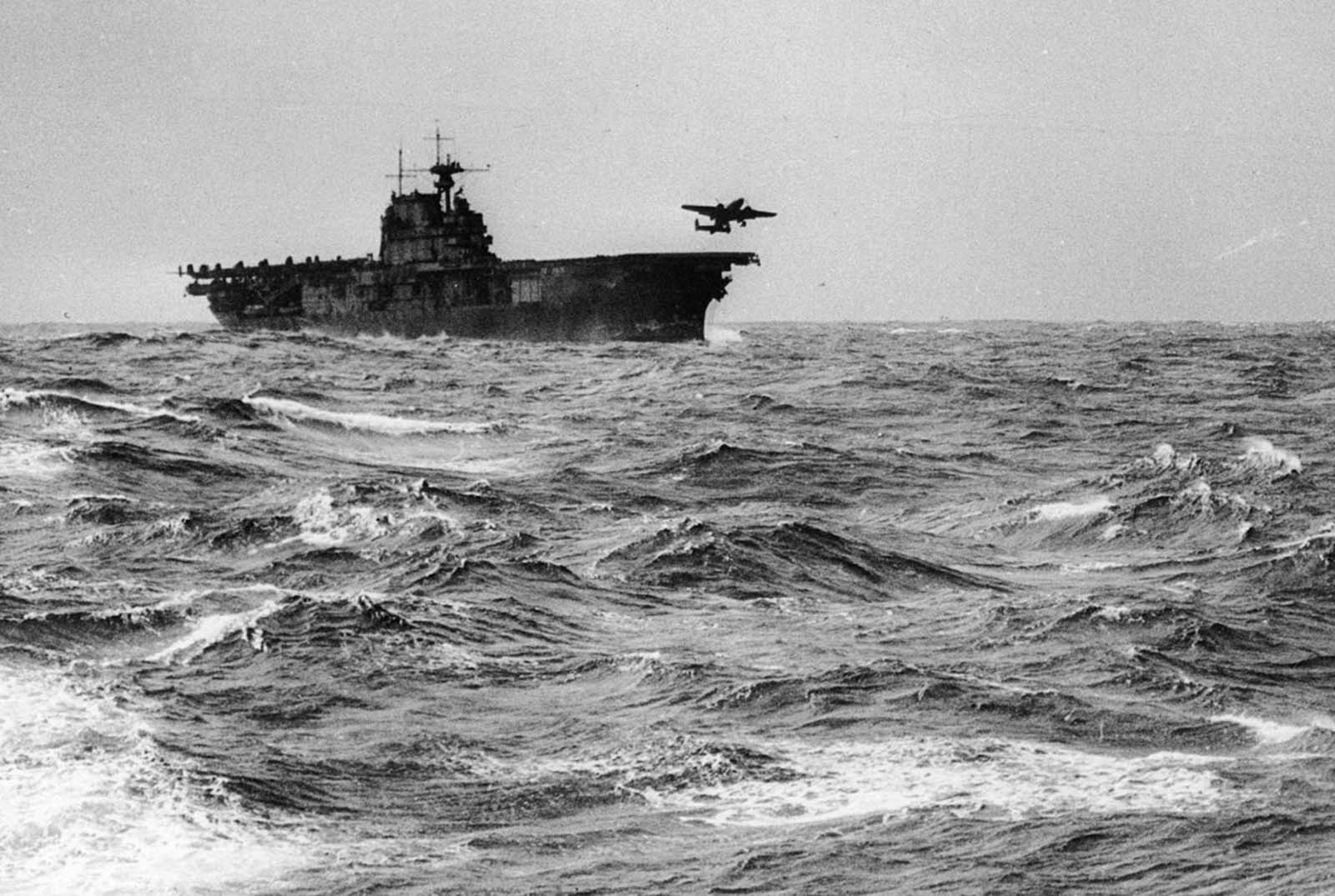 A U.S. Army Air Force B-25B Mitchell medium bomber, one of sixteen involved in the mission, takes off from the flight deck of the USS Hornet for an air raid on the Japanese Home Islands, on April 18, 1942. The attack, later known as the Doolittle Raid, inflicted limited damage, but gave a huge boost to American morale after the attacks on Pearl Harbor months earlier.