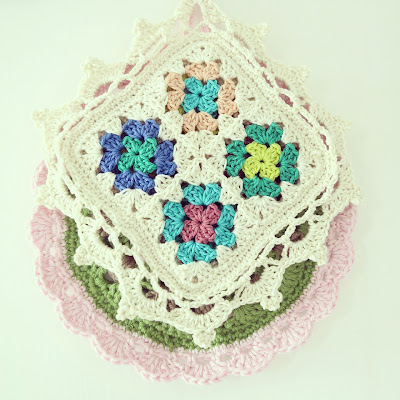 ByHaafner, crochet, potholder, pastel, white, bright, lacy edging, scalloped edging, granny square