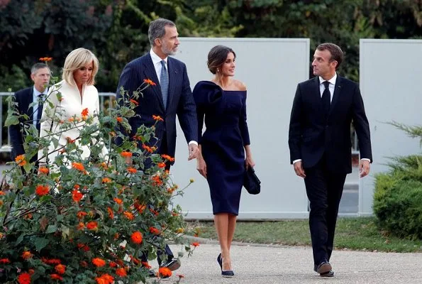 Queen Letizia wore DELPOZO flower embellished long sleeved dress. French President Emmanuel Macron and First Lady Brigitte Macron