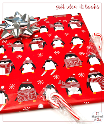 Simple Holiday Gift Idea #1: Books Picture of wrapped book with bow and candy cane