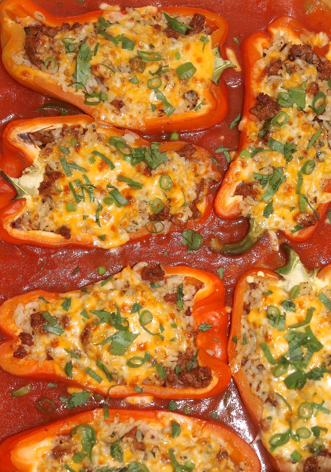 Savory Moments Chorizo and rice stuffed peppers with spiced tomato sauce