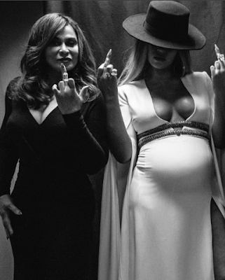 l Beyonce and her mother throw up the middle finger in new photos