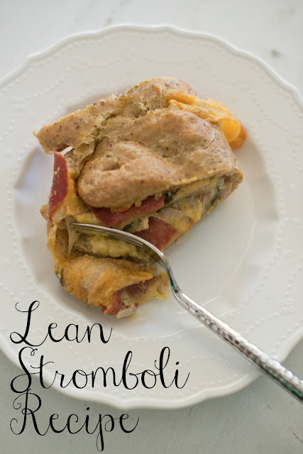 Delicious lean stromboli recipe made with chicken sausage, turkey pepperoni, and spinach! YUM!