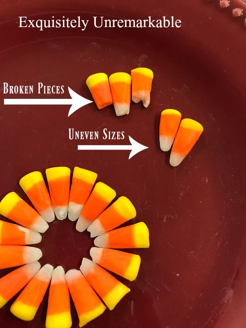 First row of candy corn on the cob and broken piece and whole ones