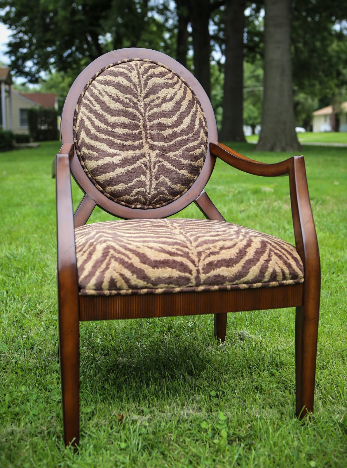 sweetpickins Zebra print fabric and wood arm chair