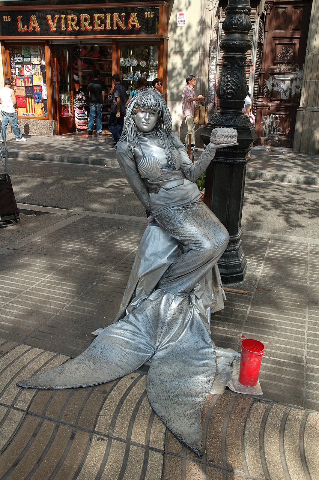 Barcelona's Las Ramblas street artists: Musing mermaid