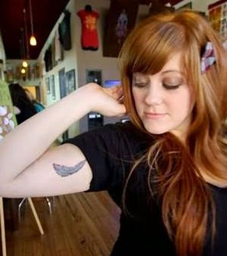 Tatuagens femininas nos bíceps Tatuagens femininas nos bíceps