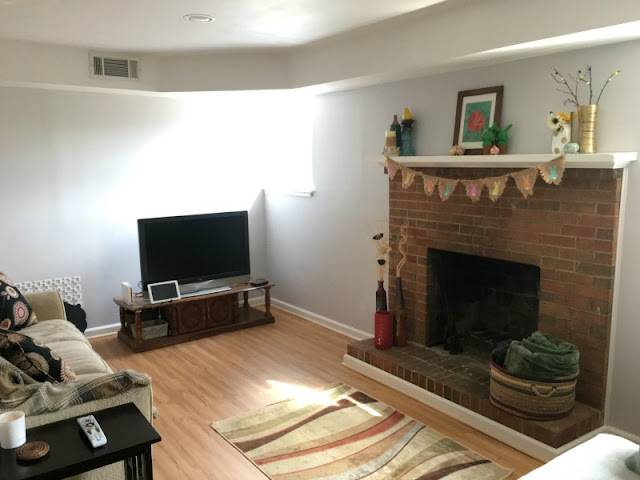 See how we took an ugly basement and turned it into a bright and cozy retreat along with adding laundry, bathroom, and mudroom spaces! Learn money saving tips and tricks from a DIYer.