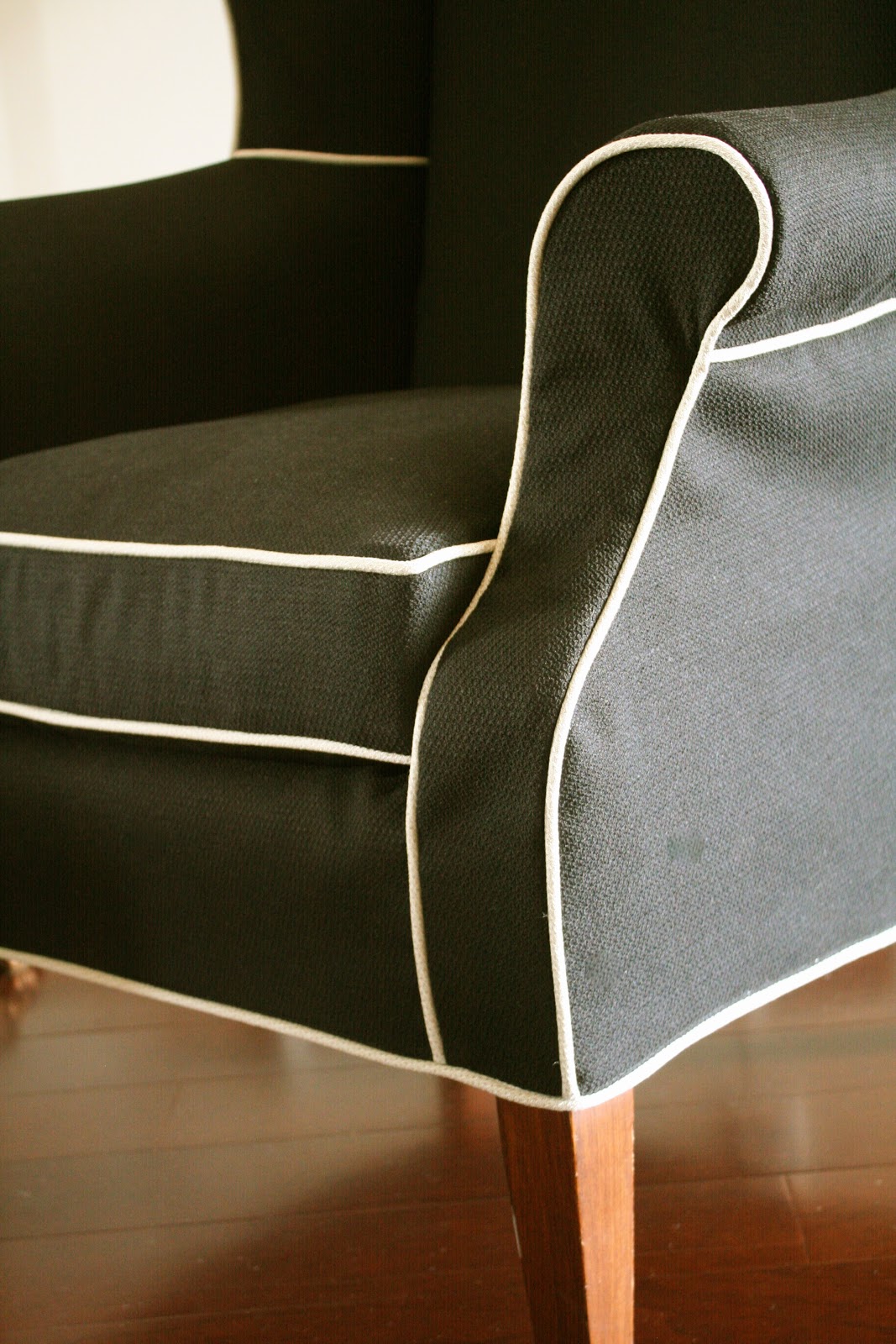 Custom Slipcovers by Shelley Black Wingback and Ottoman