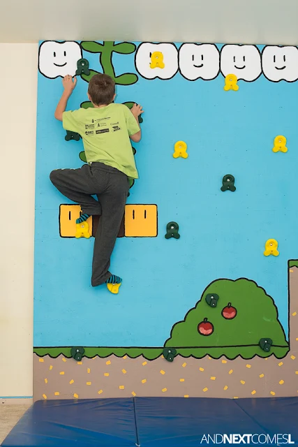 Find out how to build a climbing wall indoors for kids with this DIY Super Mario themed climbing wall tutorial