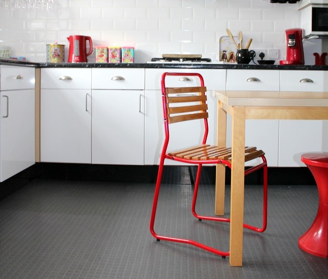 kitchen with restored red school chair