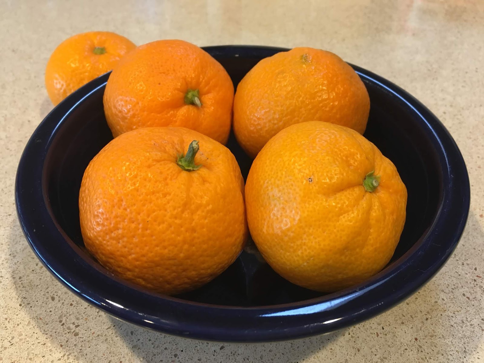 Fresh mandarins brighten a gray morning's breakfast