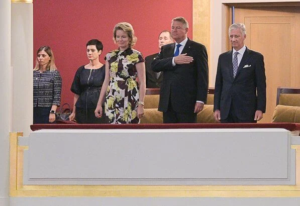 Queen Mathilde wore Erdem Finn dress bloomsbury yellow satin. Mr. Klaus Iohannis, President of Romania