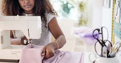 Woman sewing at home