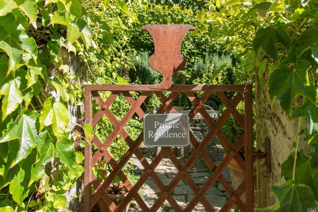 Ivy covered California home of Myra Hoefer with lush gardens and French inspired interiors