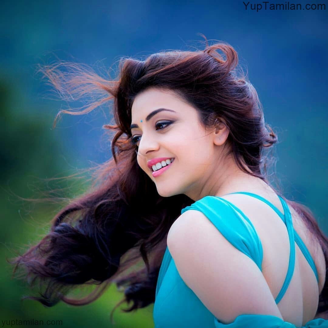 Kajal-Agarwal-Sexy-navel-pictures-wearing-Saree