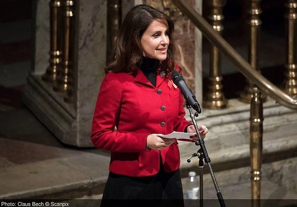 Princess Marie attended the Annual Christmas Concert held by Danish Aids Foundation at Trinitatis Church. gift