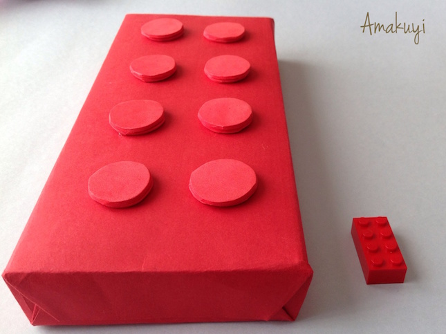 empaquetado- embalaje con forma de pieza Lego