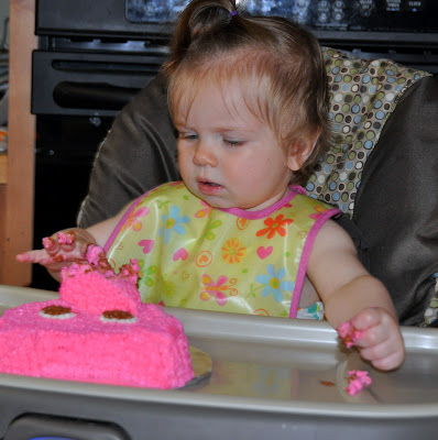 Birthday girl attacks pig cake