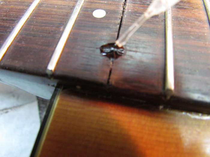 Filling Guitar Fingerboard Holes Crawls Backward (When Alarmed)