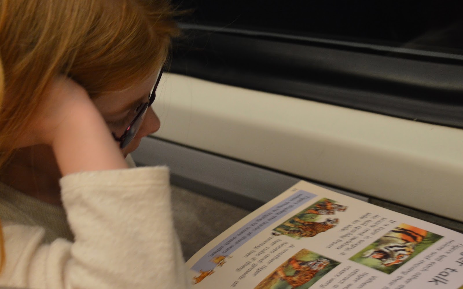 A family day trip to London with Virgin Trains East Coast -  reading on train
