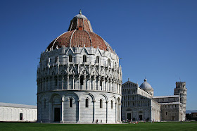 The Campo dei Miracoli in Pisa, with the baptistery in the foreground and the Leaning Tower beyond the cathedral
