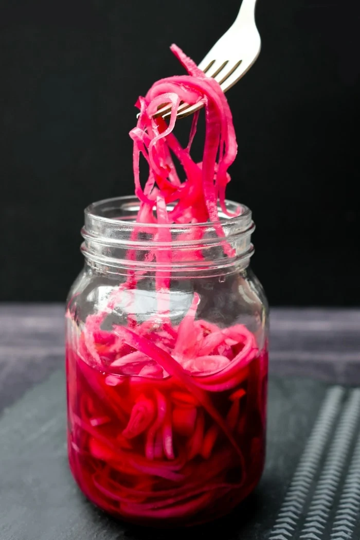 a jar of easy 10 minute red pickled onions