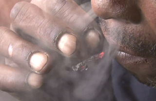 Smokers fingers and lips are burned and blister due to addits not want to throw away any butts of their Nyaope