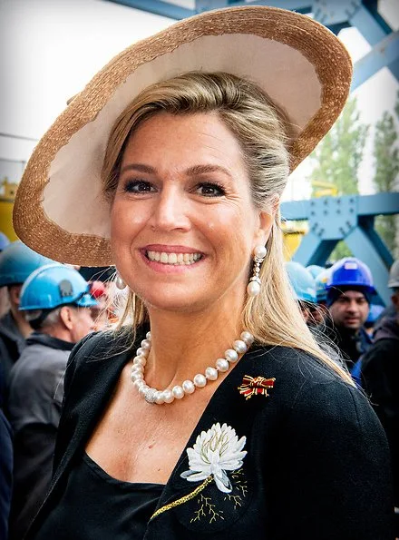 Queen Maxima wore Matthijs van Bergen Coppens Lelies jacket and floral print skirt