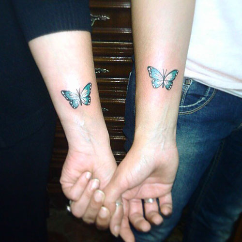 Casal Tatuagem de Borboleta no Braço