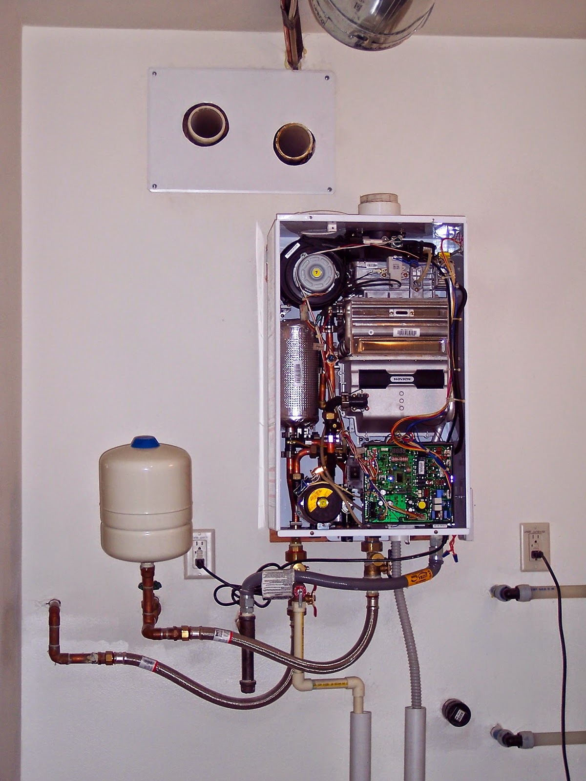 Building a Home Adjusting Inclination of Navien Exhaust Pipe