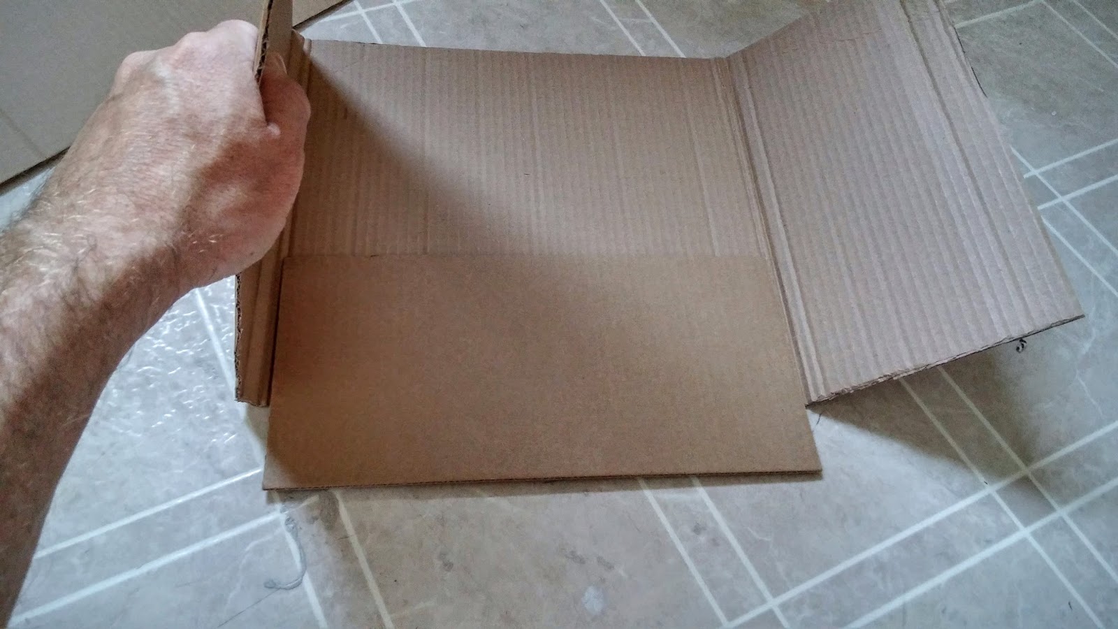 How to make a nice looking garbage can out of a cardboard box