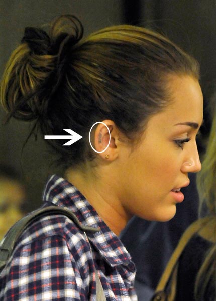 a new tattoo Miley Cyrus?