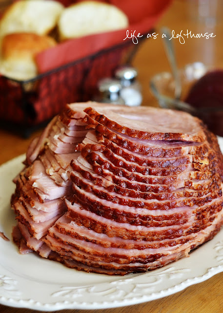 Crock Pot Maple Brown Sugar Ham is ham covered in brown sugar, maple syrup and pineapple juice slow cooked in the Crock Pot. Life-in-the-Lofthouse.com