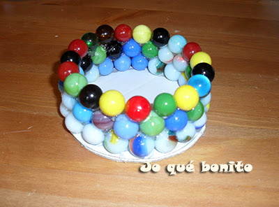 Portavelas con canicas