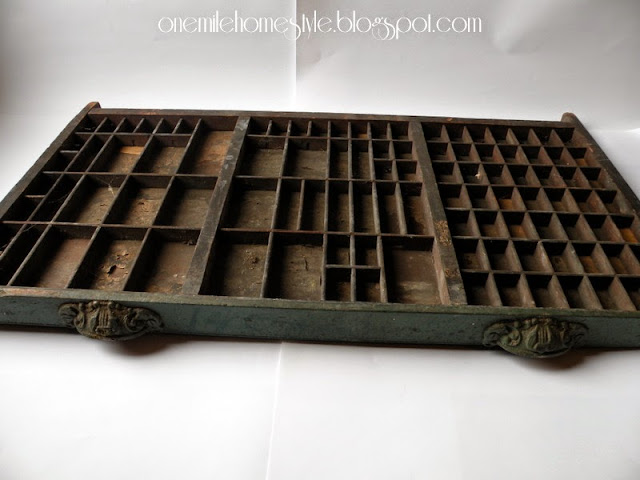 Vintage printer's tray with ornate handles