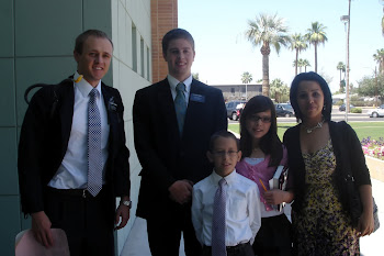 Elders Faldmo and Kinney with a family