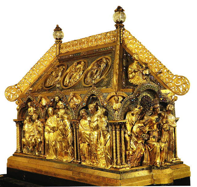 Η αριστουργηματική λάρνακα λειψανοθήκη της Notre-Dame Flamande στη Τουρνέ, που περιέχει λείψανα των αγίων Eloi και Amand. Θεωρείται ένα από τα επτά θαύματα του Βελγίου. Κατασκευάστηκε το 1205.