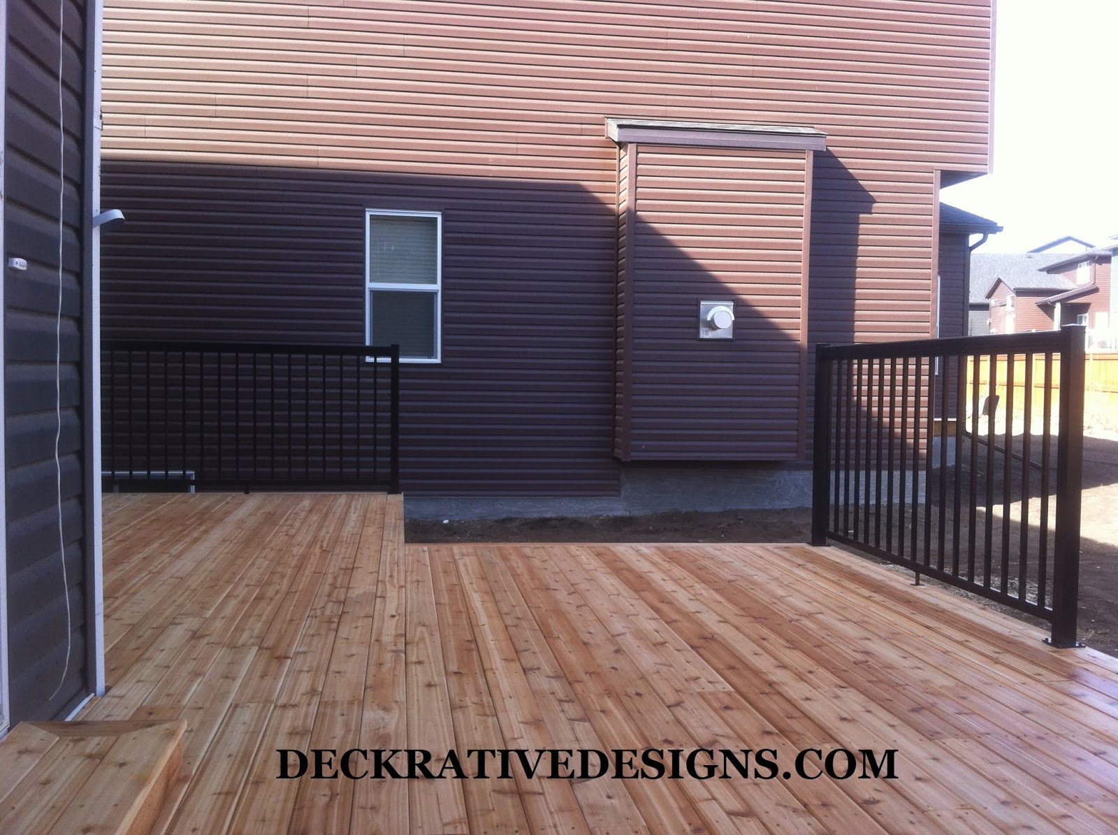 Calgary deck builders Calgary decks Cedar decking designs with metal