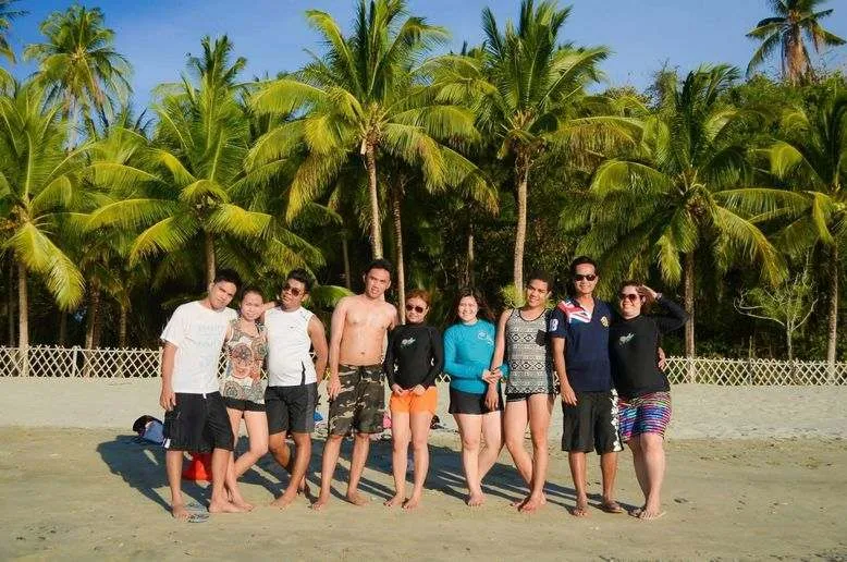 Group of bloggers on the beach of Puerto Galera