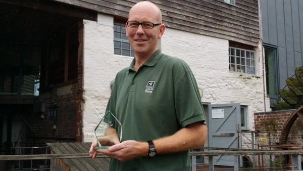 Devon Wildlife Trust's Paul Martin with the DEBI Award
